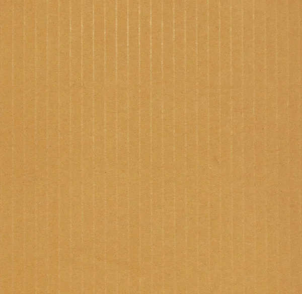 ソフト パステル カラーの背景として有用な茶色の段ボール紙 — ストック写真