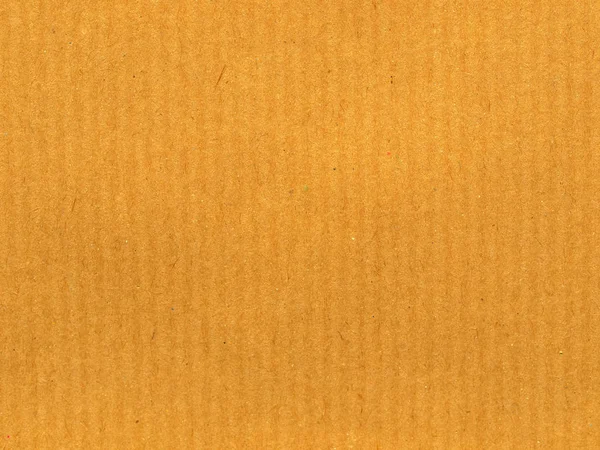 ソフト パステル カラーの背景として有用な茶色の紙の空白のシート — ストック写真