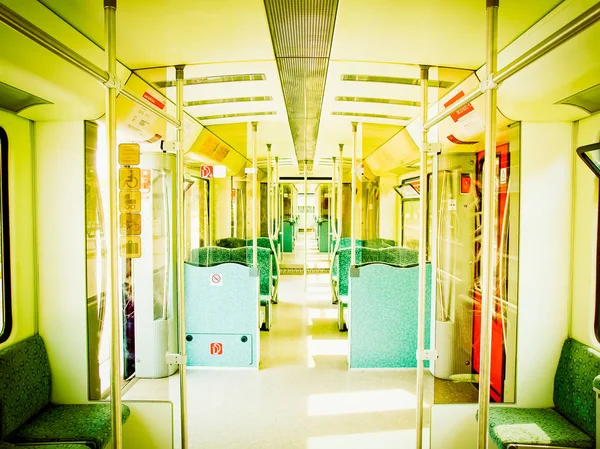 Central diminishing perspective of a train interior vintage retro