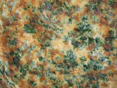 Yağda kızartılmış yumurta ya da tavada yağlı omlet.