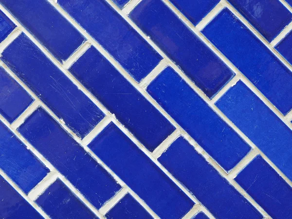 mavi tuğla çapraz çinileri ile arka plan olarak yararlı duvar