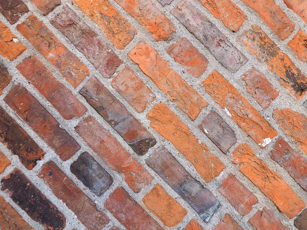 red brick texture useful as a background with diagonal tiles