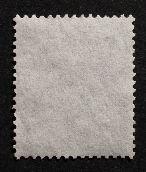 空白邮票 在黑色背景上有复制空间 — 图库照片