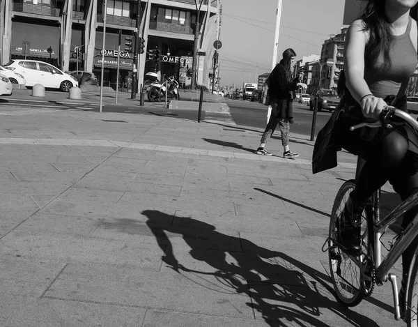 Pedestrian and bike in Turin in black and white — Stock Photo, Image