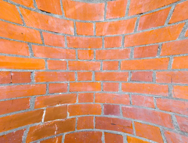 Curved red brick wall background — Stock Photo, Image