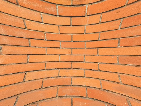 Gebogene rote Ziegelwand Hintergrund — Stockfoto