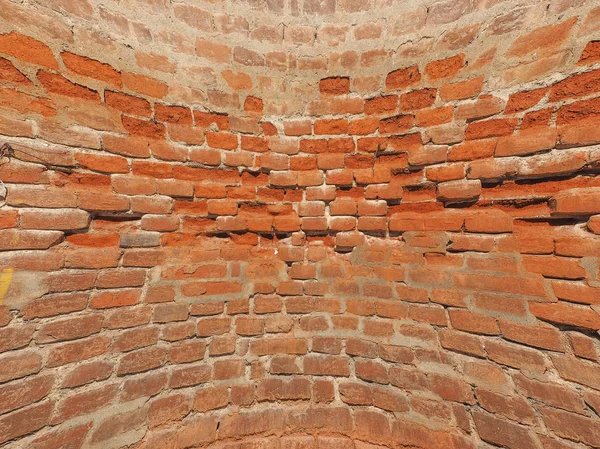 Fondo de pared de ladrillo rojo curvado — Foto de Stock