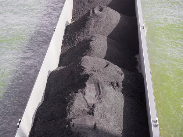 barge transporting earth on river Rhein in Koeln