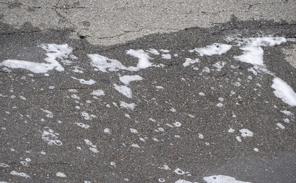 Detergent foam on tarmac — Stock Photo, Image