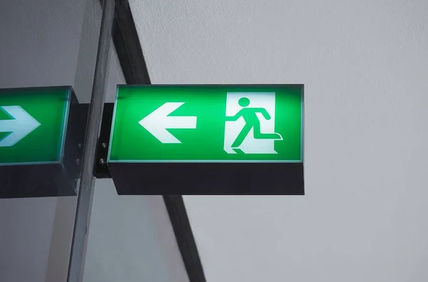 Green emergency exit fire escape wayout sign