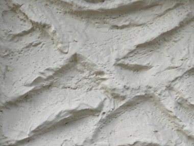 Açık gri alçı duvar arka plan olarak kullanışlı