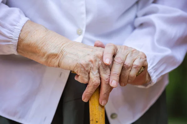 Senior Woman Hands Holding Walking Stick — Stock Photo, Image