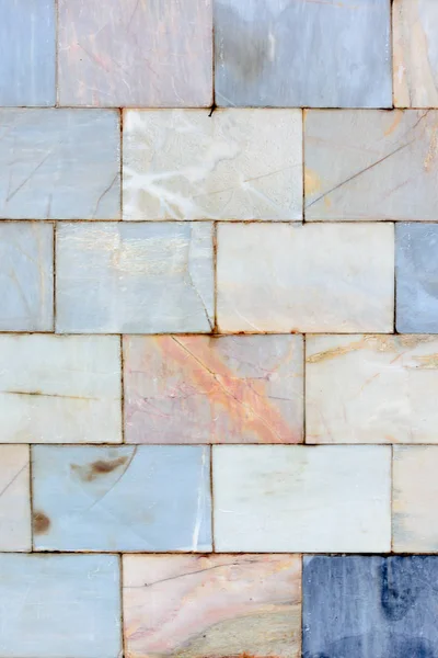 Taş dokusu. Güzel boş arka plan. Sıradışı duvar ışık mermer fayans.