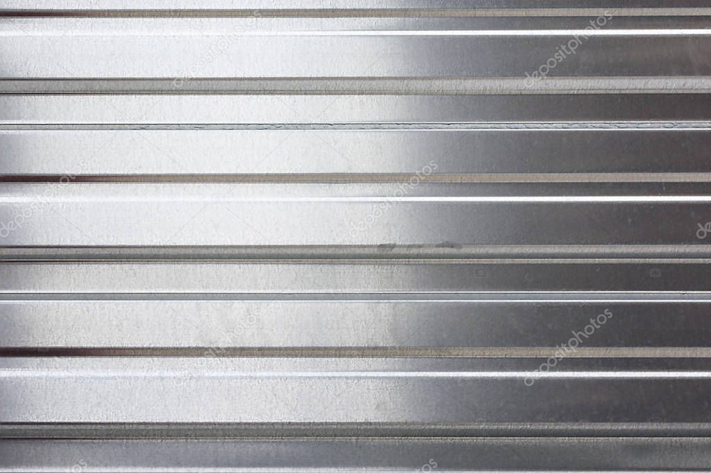 Wall of sheet metal, corrugated metal. Background texture
