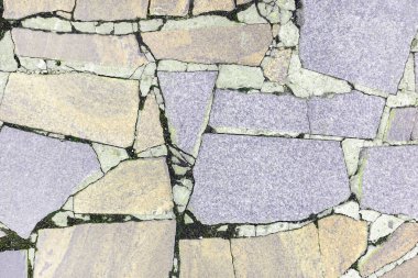 Arka plan bir mozaik doku ile. Granit büyük bej ve Lila parçaları düzensizce koyulur.