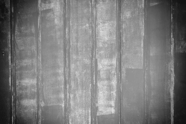 The wall is made of smooth painted strips. Empty background with stains of paint. A photograph of the bars painted gray with a vignette. — Stock Photo, Image