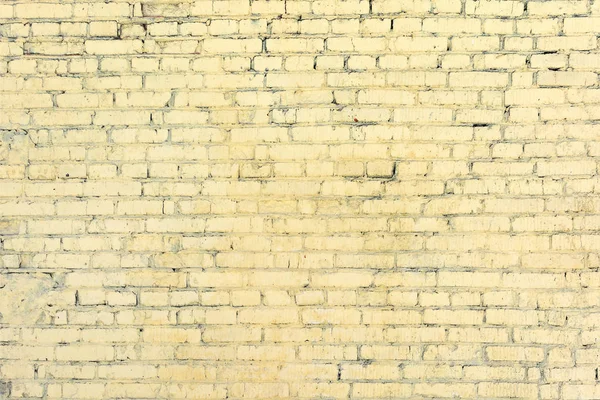 Желтая кирпичная стена из невидимых рядов. Пустой фон. Текстура кладки . — стоковое фото