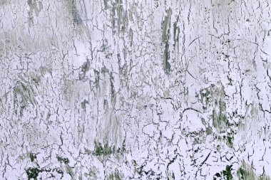 Kırık solgun Lila boya ile arka plan. Doku eski kaba yüzeyler. Bir duvar bir olağandışı, soyut deseni.