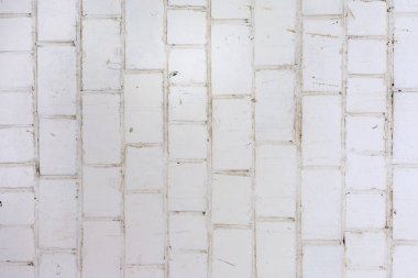 Tuğla duvar kirli beyaz boya ile boyanmış. Doku duvar. Güzel boş geçmiş.