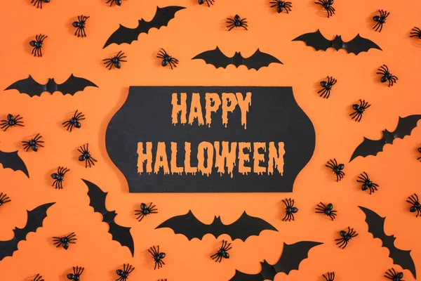 Los Murciélagos Arañas Halloween Están Dispuestos Caóticamente Sobre Fondo Naranja —  Fotos de Stock