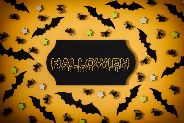Arañas Decorativas Asteriscos Murciélagos Halloween Están Dispuestos Sobre Fondo Naranja —  Fotos de Stock