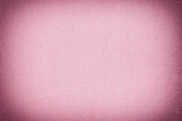 Текстура тёмно-розовой бумаги с неровностями и тиснением крупным планом. Пустой фон для макетов . — стоковое фото