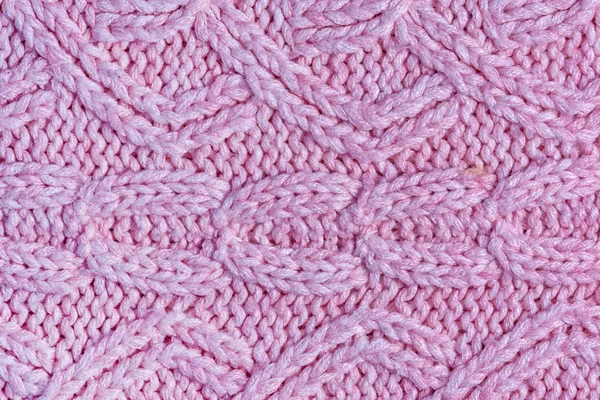 패턴 클로즈업 니트 질감. 레이아웃에 대한 빈 분홍색 배경. — 스톡 사진