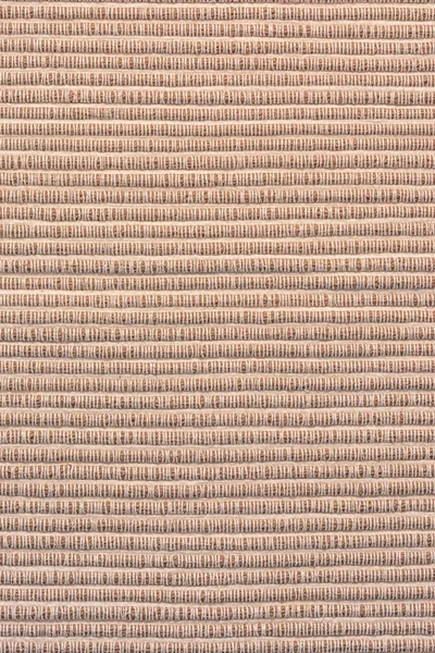 Rivestimento del divano primo piano. Texture di tessuto grezzo denso a costine. sfondo bianco marrone per i layout . — Foto Stock