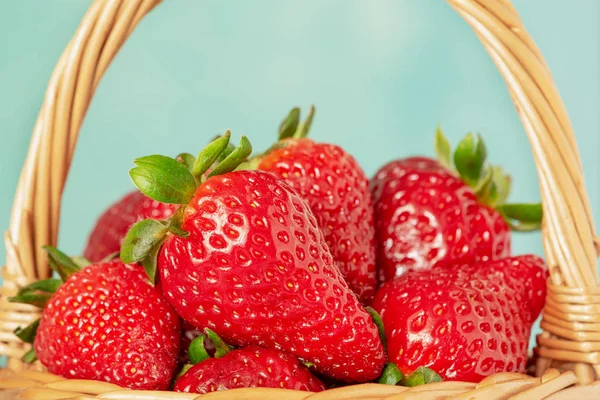 Wicker Basket with Strawberries Closeup Side View