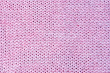 Doku, açık Lila örme örgü yakın yukarı. Boş yün arka plan.