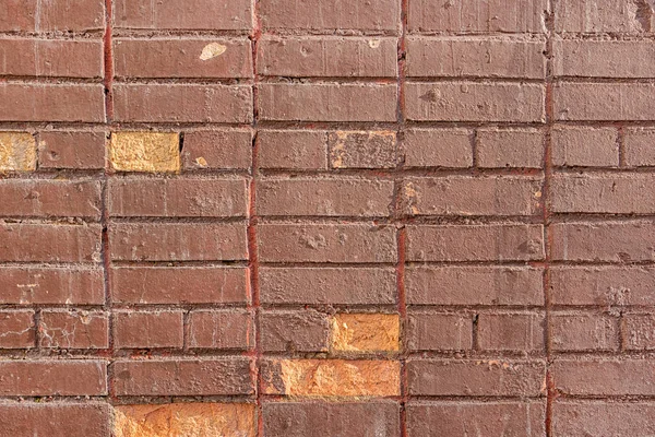 Old brick wall is painted with brown paint. Blank background with brickwork texture. — Stock Photo, Image