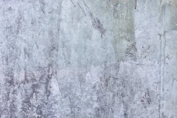 Декоративное покрытие с неровной текстурой. Серый шпатлевка. Старая штукатурная стена с пятнами и царапинами. Пустой фон . — стоковое фото