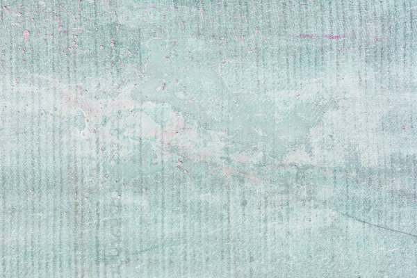 Шифер с пятнами крупным планом. Абстрактный светло-бирюзовый фон для макетов и площадок. Тонированное фото старого забора
