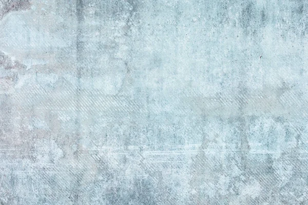 Eski beton duvar. Dokuları olan bir fotoğraf. Siteler ve yerleşimler için açık mavi arkaplan