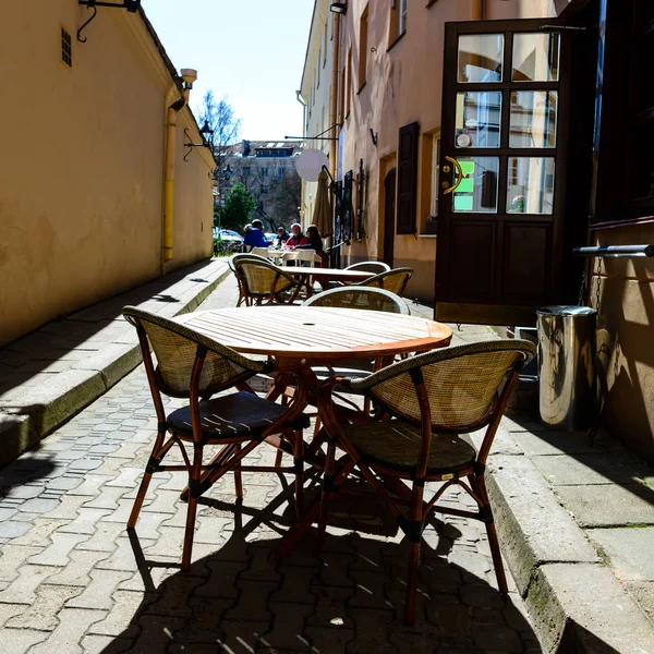 Street cafe or restaurant in the European city. Chairs and table