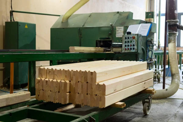 Glued pine timber beams in a woodworking factory — Stock Photo, Image