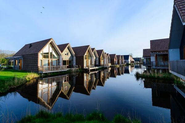 Modern beautiful houses on water — Stock Photo, Image