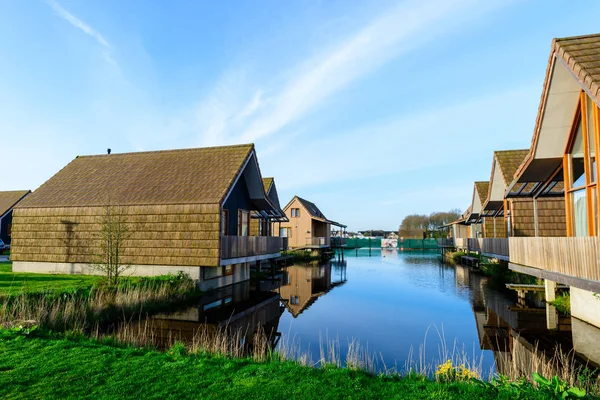Modern beautiful houses on the water — Stock Photo, Image