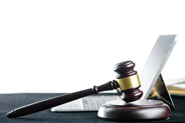 Wooden judges gavel on a computer keyboard on light background. — Stock Photo, Image