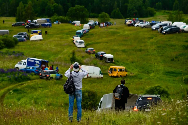 Cars in the field during festival — Stock Photo, Image