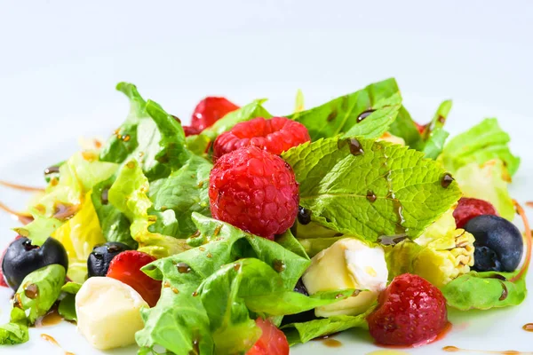 Appetizing fresh vegetarian salad with different berries, tomato — Stock Photo, Image