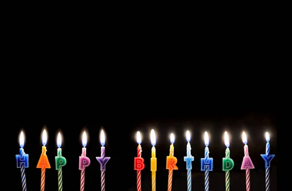 Queimando coloridas velas de aniversário feliz, espaço de cópia — Fotografia de Stock