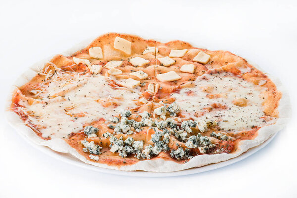 Delicious pizza with different kinds of cheese on a thin base.