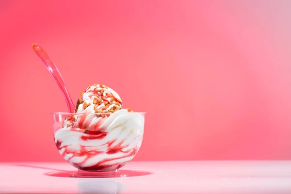 Plastic cup of an strawberry sundae — Stock Photo, Image