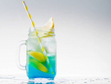 lemonade with lemon and lime in mason jar clipart