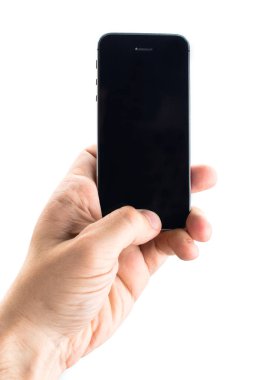 El ele tutuşan akıllı telefon.