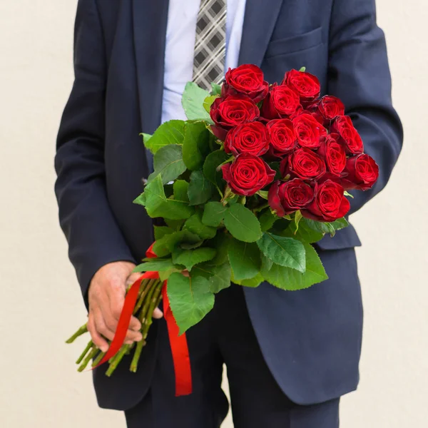 man with roses