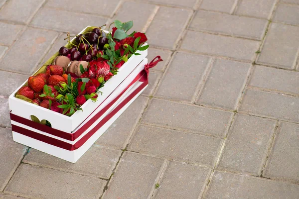 gift box with flowers and berries