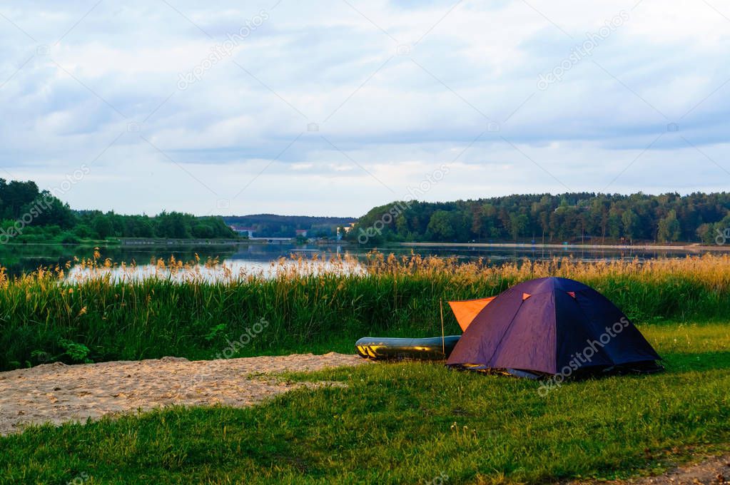 camping tent near a lake
