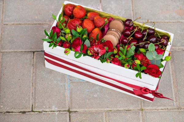 gift box with flowers and berries